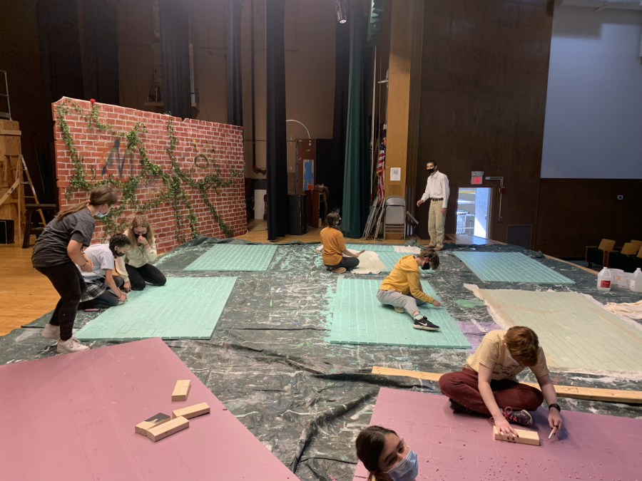 The set crew is busy at work designing and building the set for Romeo and Juliet