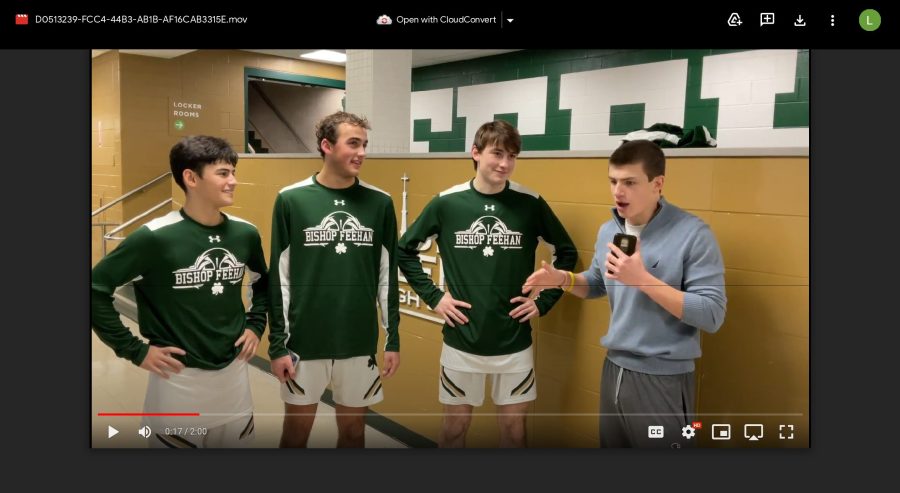 Varsity Basketball Team Captains (from left to right) Dylan Capua, Jon Mignacca and Jack Chabot being interviewed by Max Certuse after a triple overtime win over Walpole.