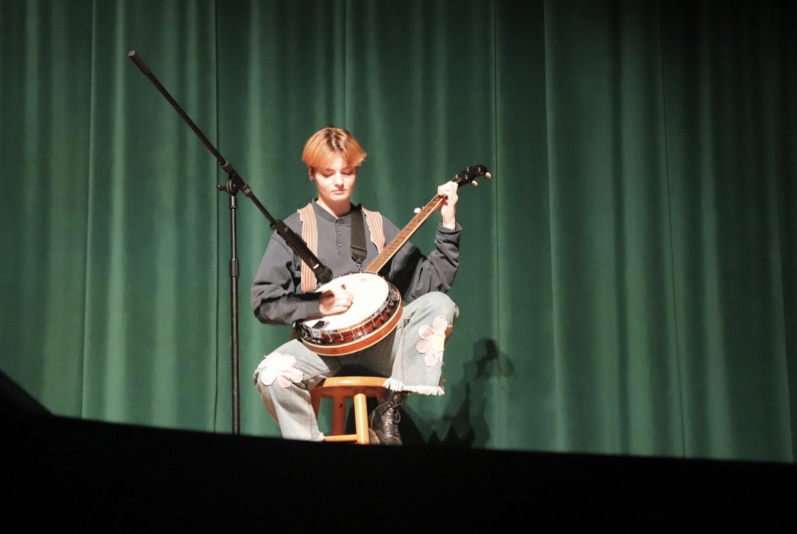 AJ Javery (‘24) playing the banjo, just one of many instruments this musician knows. 