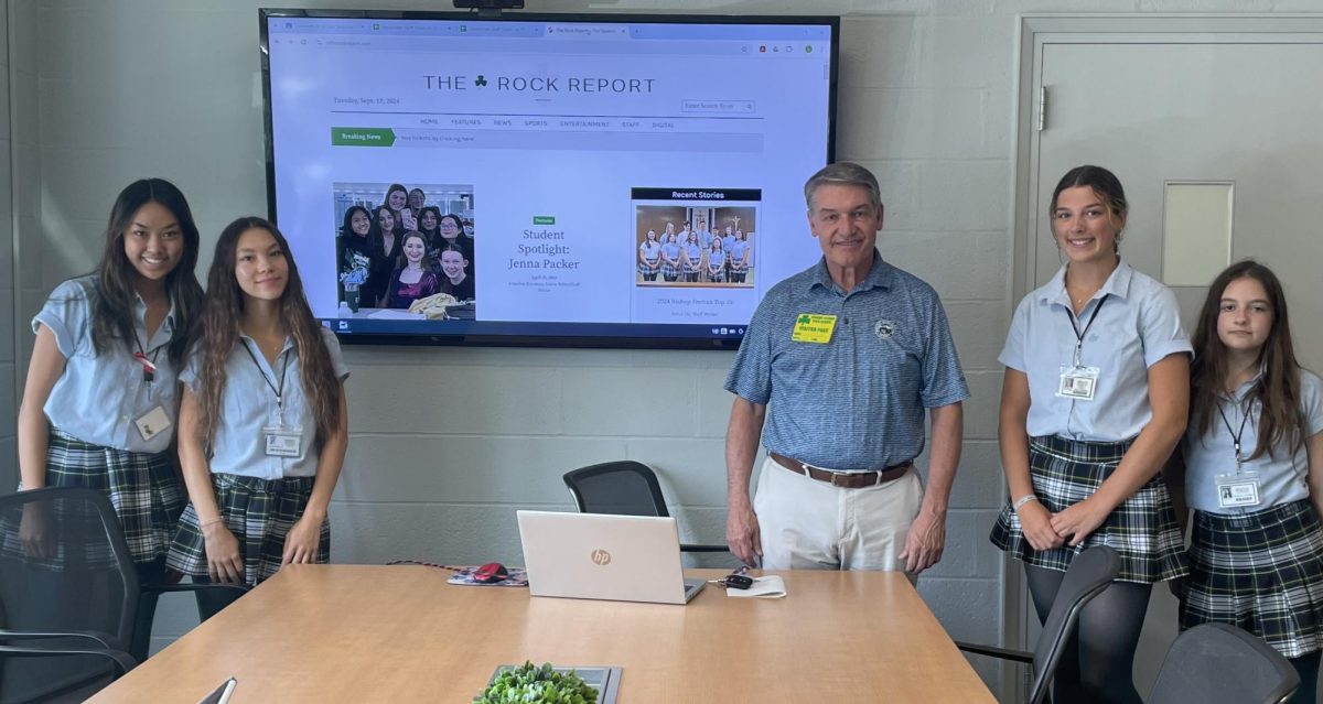 Feehan alum, Mr. Kirby shared has expertise as an adviser to The 'Rock Report this year. Here he is pictured with some of the staff.
(left to right : Katherine Zhang, Fiona McCally, Mr. Kirby, Ava Hanley, Addie Sullivan)