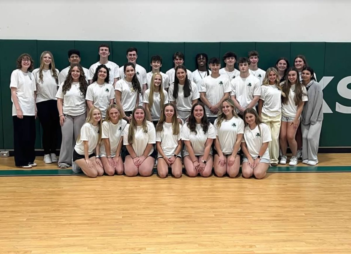 All student travelers in the Rock gymnasium before leaving for the airport. 