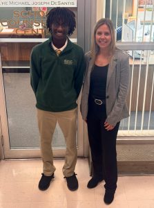 Alex Ombati and Mrs. Rose outside of the School Counseling Office.