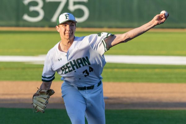 Brody Bumila pitching for the Bishop Feehan Shamrocks